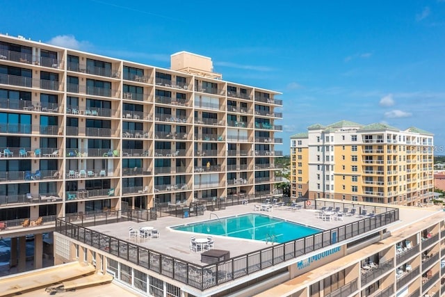 view of swimming pool featuring a patio area