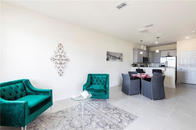 living room featuring light tile patterned floors