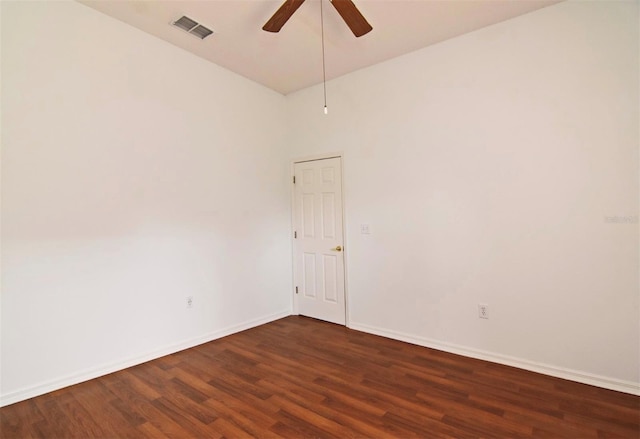 unfurnished room featuring ceiling fan and dark hardwood / wood-style flooring