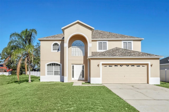 view of front facade featuring a garage and a front yard