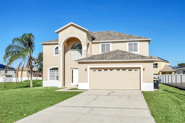 view of front facade featuring a garage and a front lawn