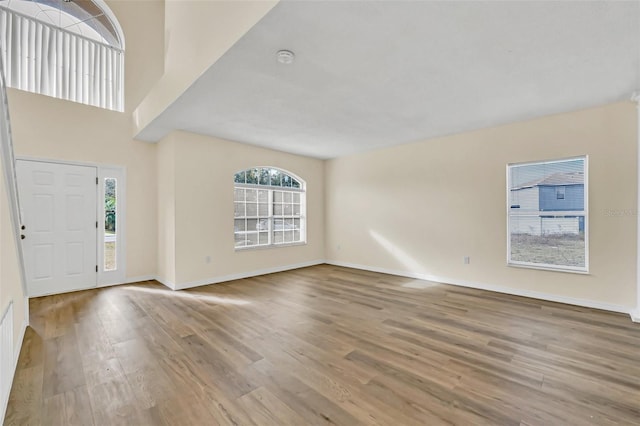 foyer entrance with hardwood / wood-style flooring