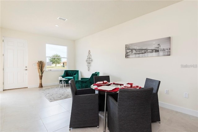 view of tiled dining space