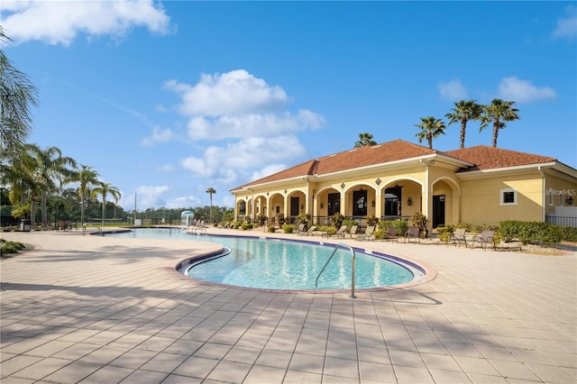 view of swimming pool featuring a patio