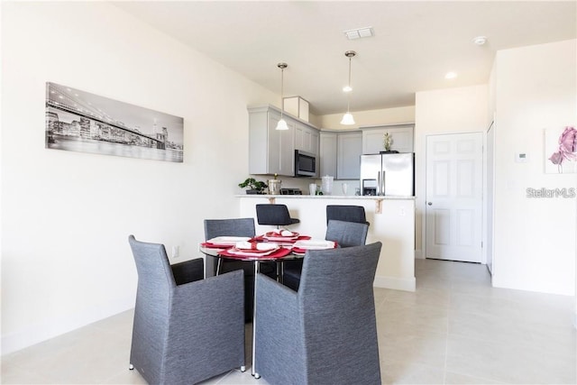 dining space with visible vents