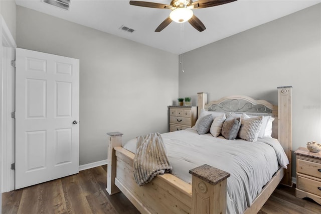 bedroom featuring ceiling fan and dark wood-type flooring