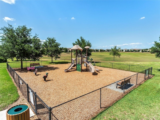 view of jungle gym with a lawn