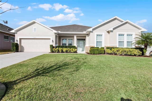 single story home with a front yard and a garage