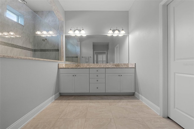 bathroom featuring vanity and walk in shower