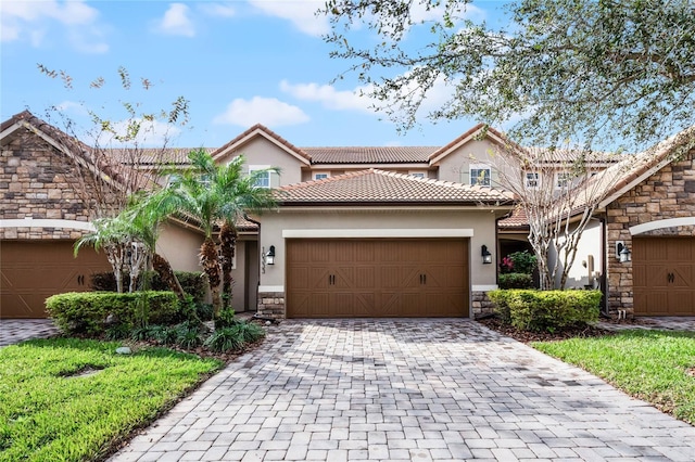 view of front of property with a garage