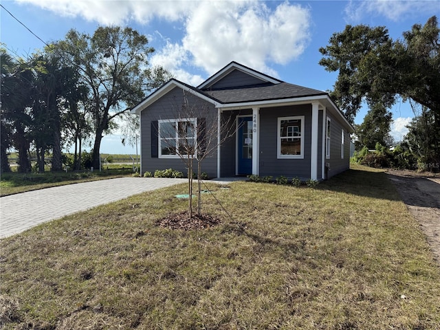 view of front of home with a front yard