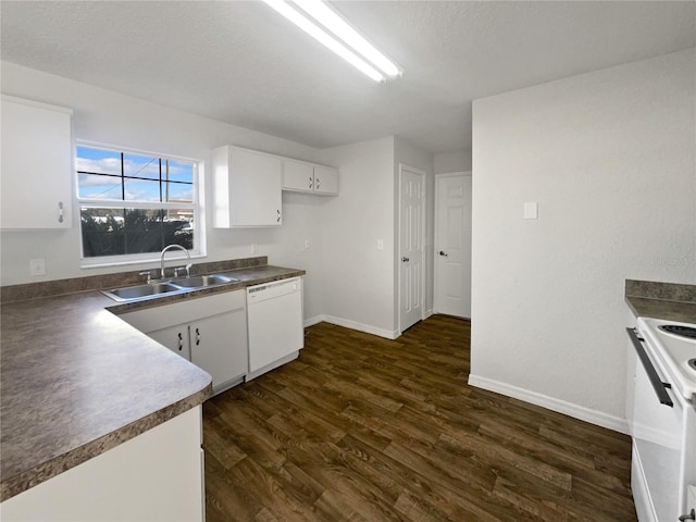 kitchen with dark hardwood / wood-style flooring, white appliances, a textured ceiling, sink, and white cabinets