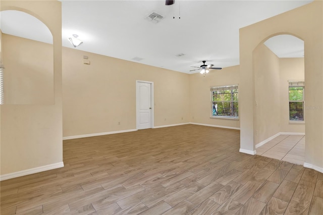 unfurnished room with ceiling fan