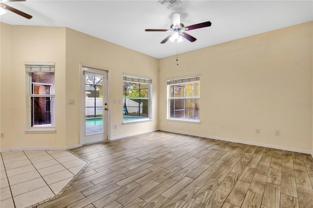 unfurnished room with ceiling fan