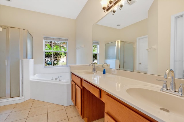 bathroom with tile patterned floors, separate shower and tub, and vanity