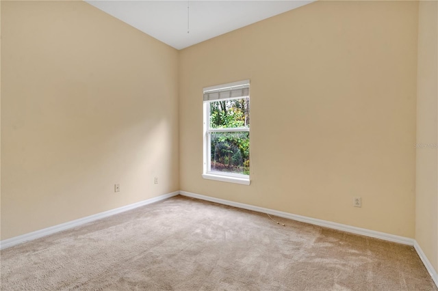 empty room with light colored carpet