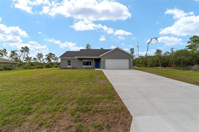 ranch-style home with a front yard and a garage