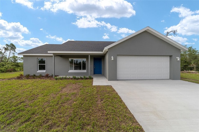 ranch-style house with a front lawn and a garage