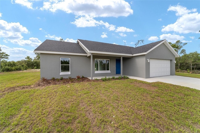 ranch-style house featuring a front yard and a garage