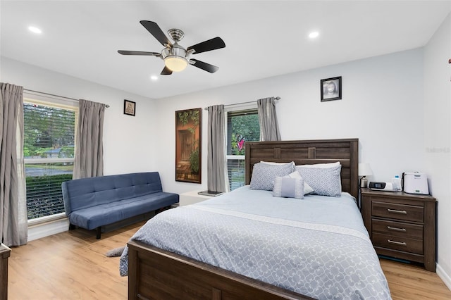 bedroom featuring ceiling fan and light wood-type flooring