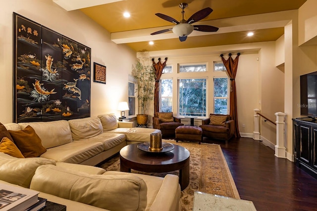 living room with ceiling fan and dark hardwood / wood-style flooring