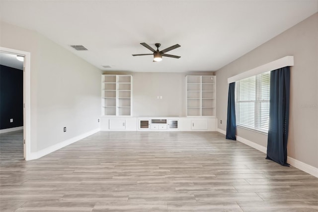 unfurnished living room with light hardwood / wood-style floors and ceiling fan