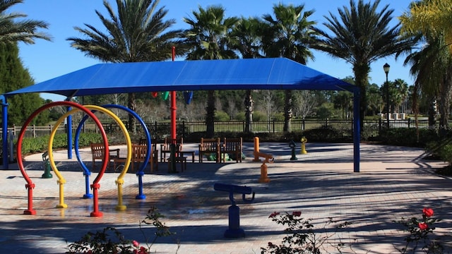 view of property's community featuring a playground