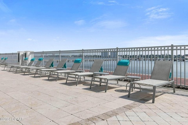 view of patio / terrace with a water view