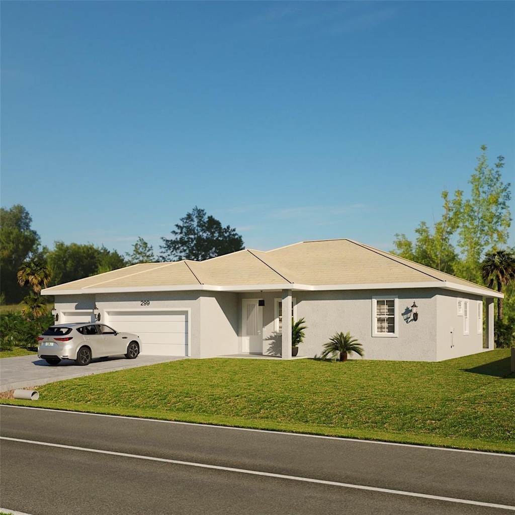 view of front of house featuring a front yard and a garage