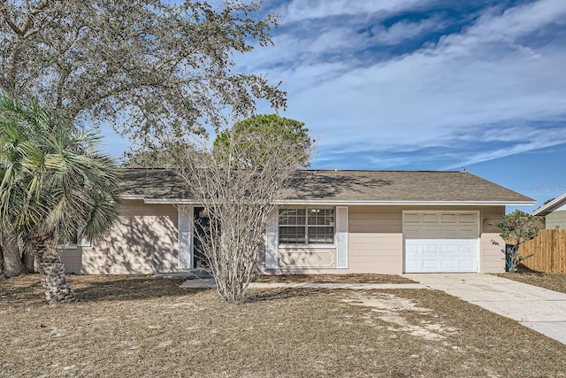 single story home with a garage