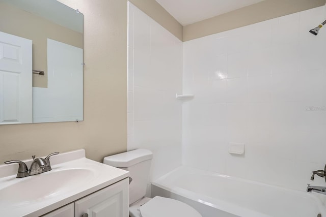 full bathroom featuring shower / tub combination, vanity, and toilet