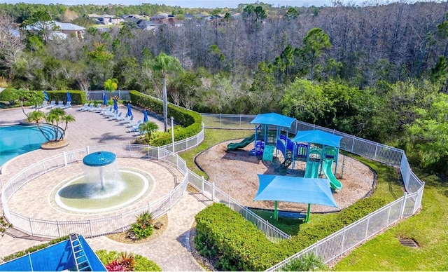 view of pool with a playground