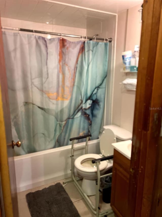 full bathroom with tile patterned floors, vanity, toilet, and shower / tub combo