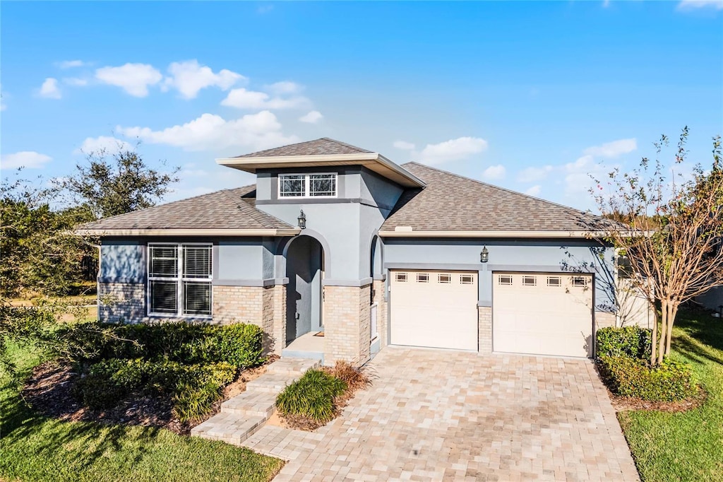 view of front of property with a garage