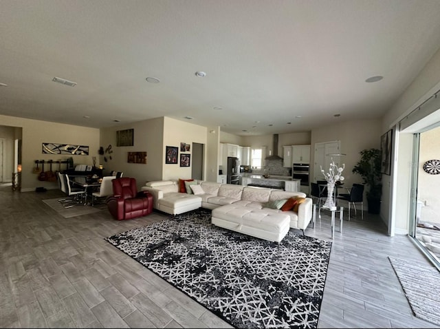 living room featuring plenty of natural light