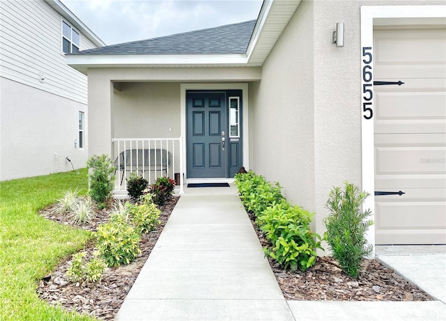 property entrance with covered porch