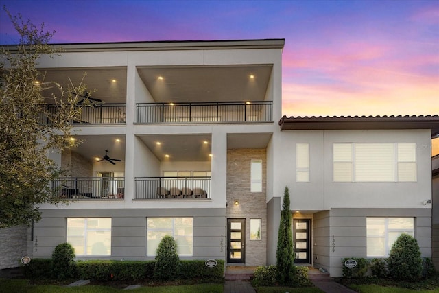 view of front of house with a balcony