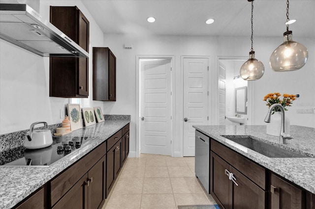 kitchen with sink, wall chimney range hood, light stone counters, stainless steel dishwasher, and electric stovetop