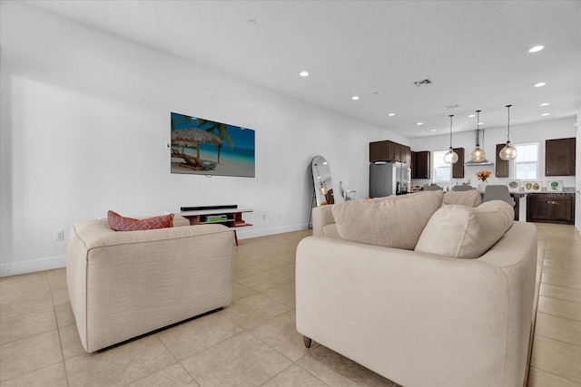 living room featuring light tile patterned floors