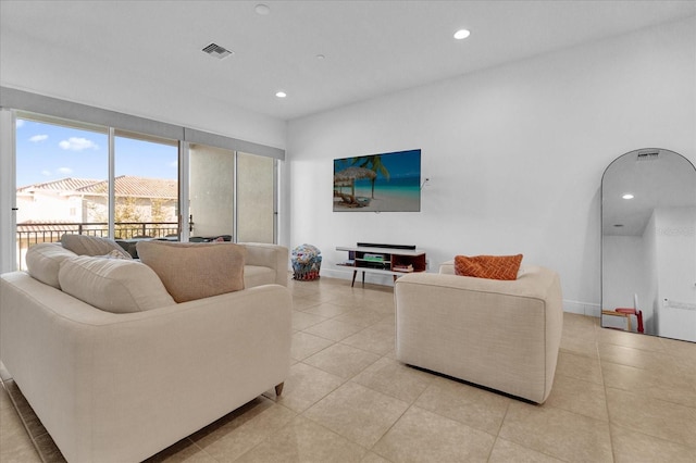 living room with light tile patterned floors