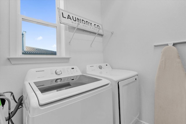 laundry room with washer and clothes dryer