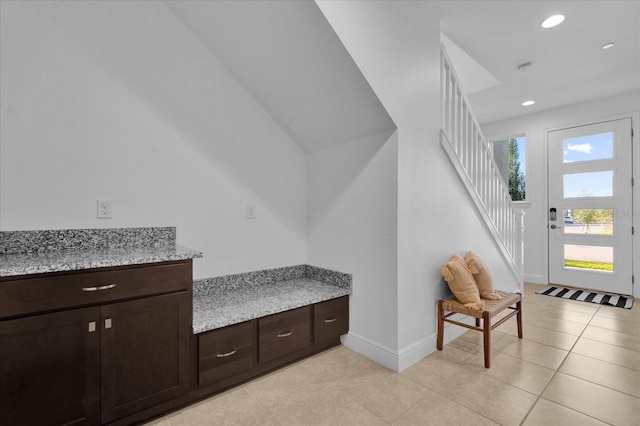 interior space with light tile patterned floors