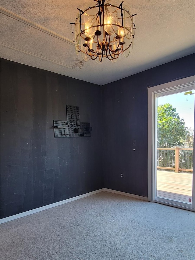 interior space with an inviting chandelier and a textured ceiling