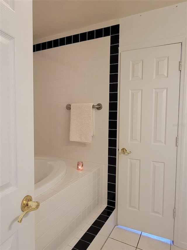 bathroom with tile patterned floors