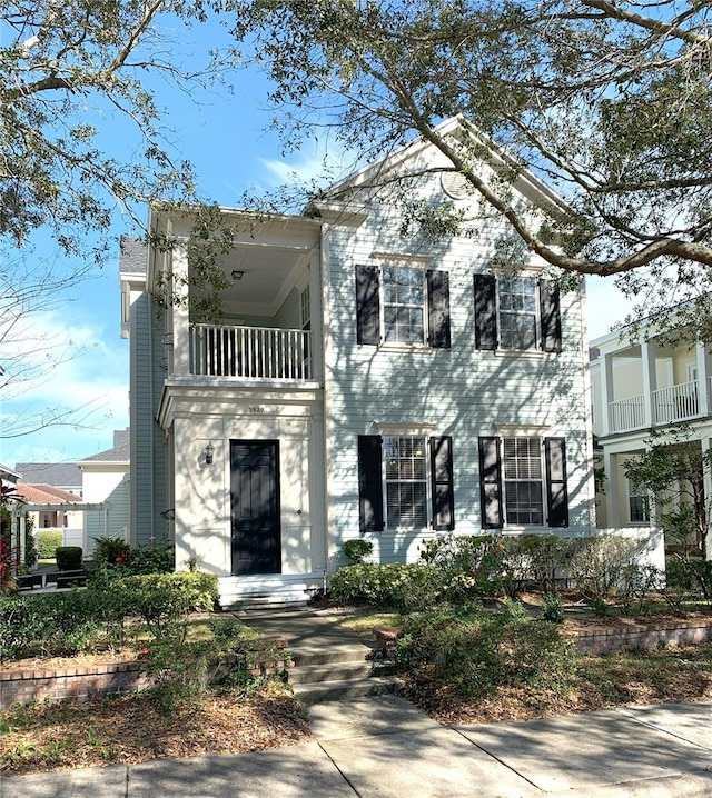 view of front facade with a balcony