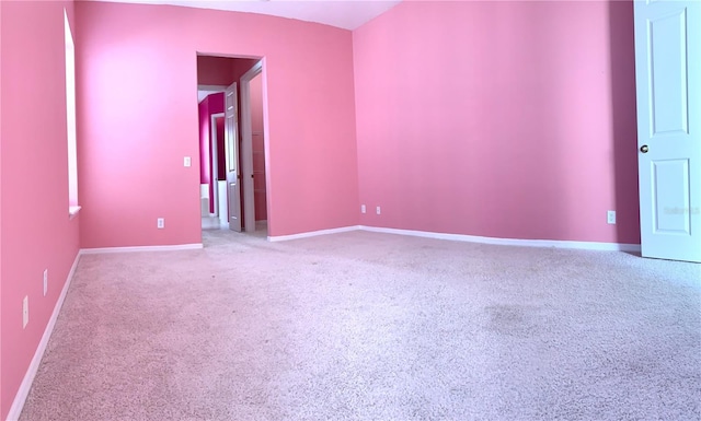 spare room with carpet flooring