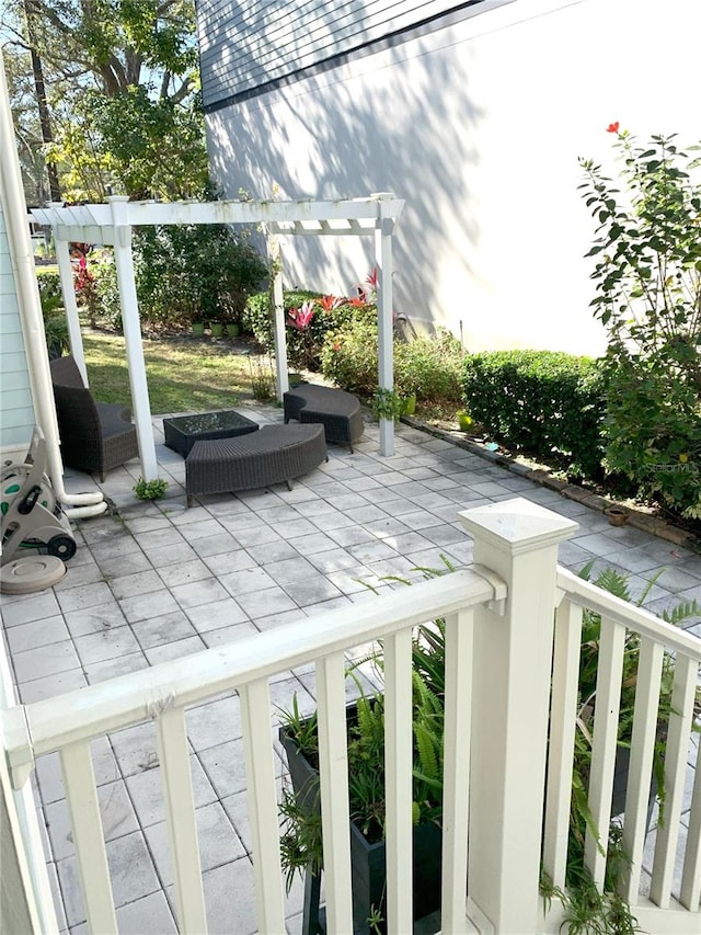 view of patio / terrace featuring a pergola