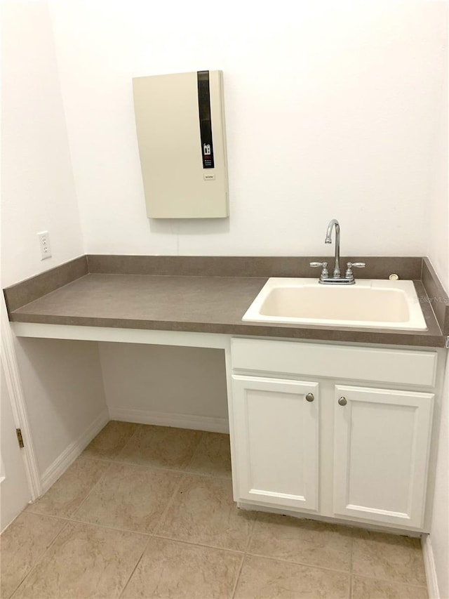 bathroom with vanity and tile patterned flooring