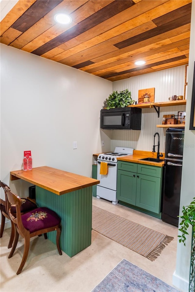 kitchen with black appliances, sink, green cabinetry, butcher block counters, and wood ceiling