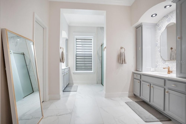 bathroom featuring vanity and ornamental molding